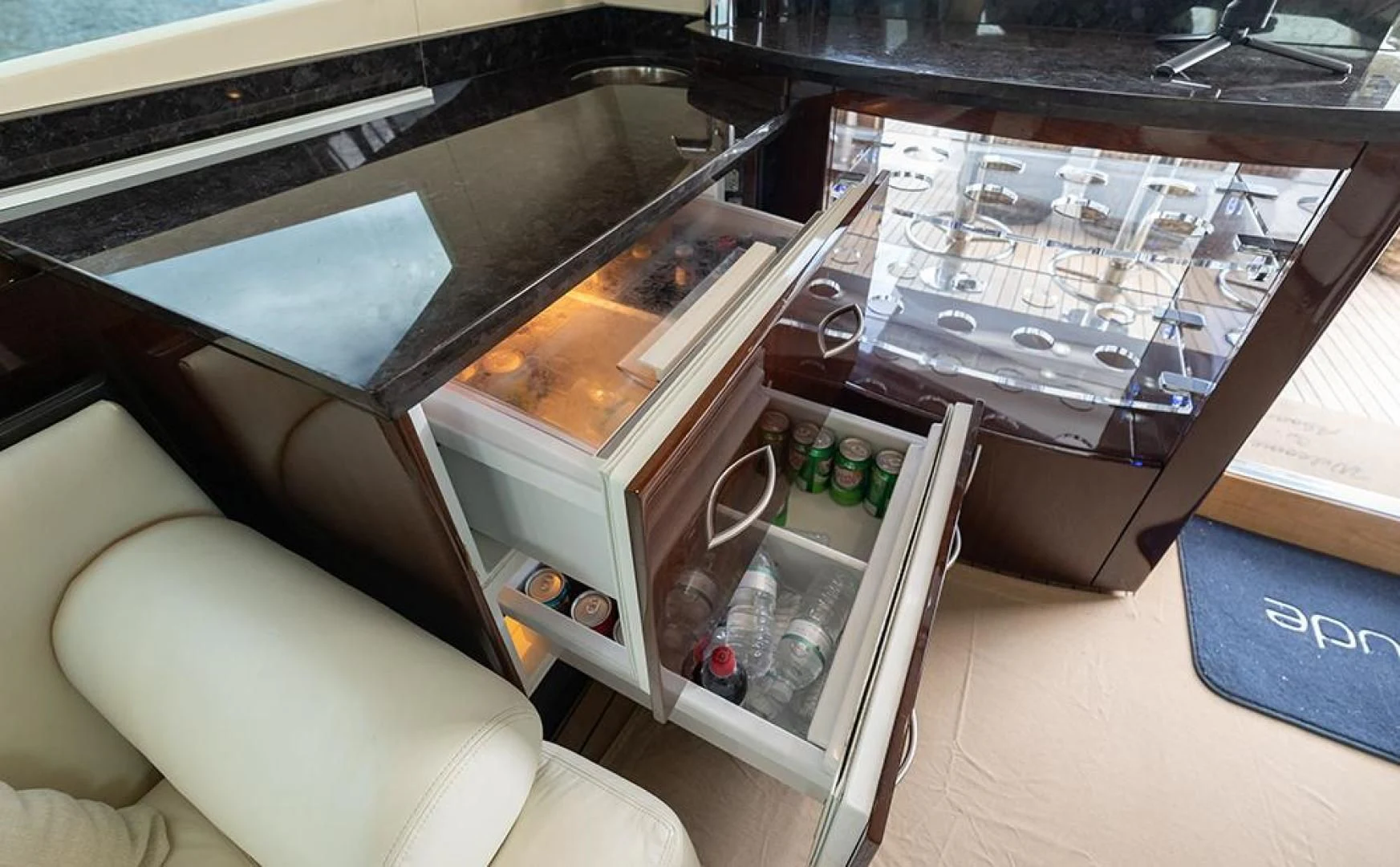 a kitchen with a glass door aboard LATITUDE Yacht for Sale