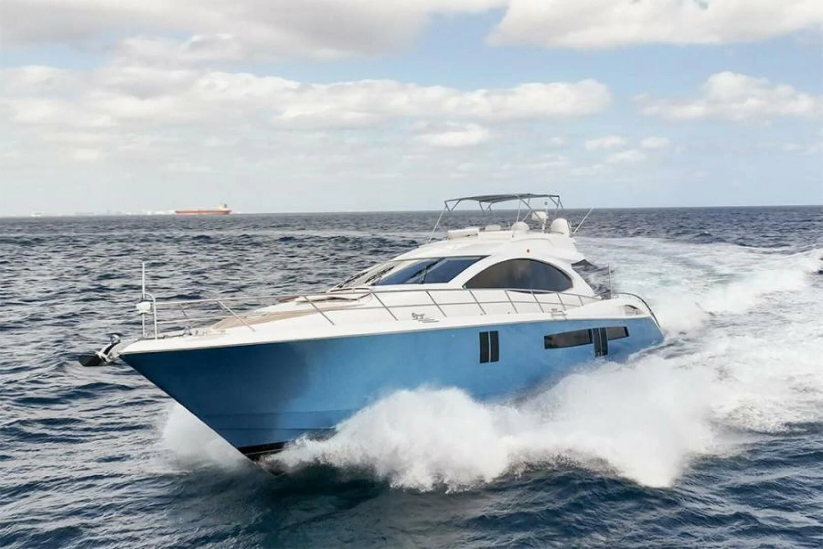 a white yacht on the water aboard LATITUDE Yacht for Sale