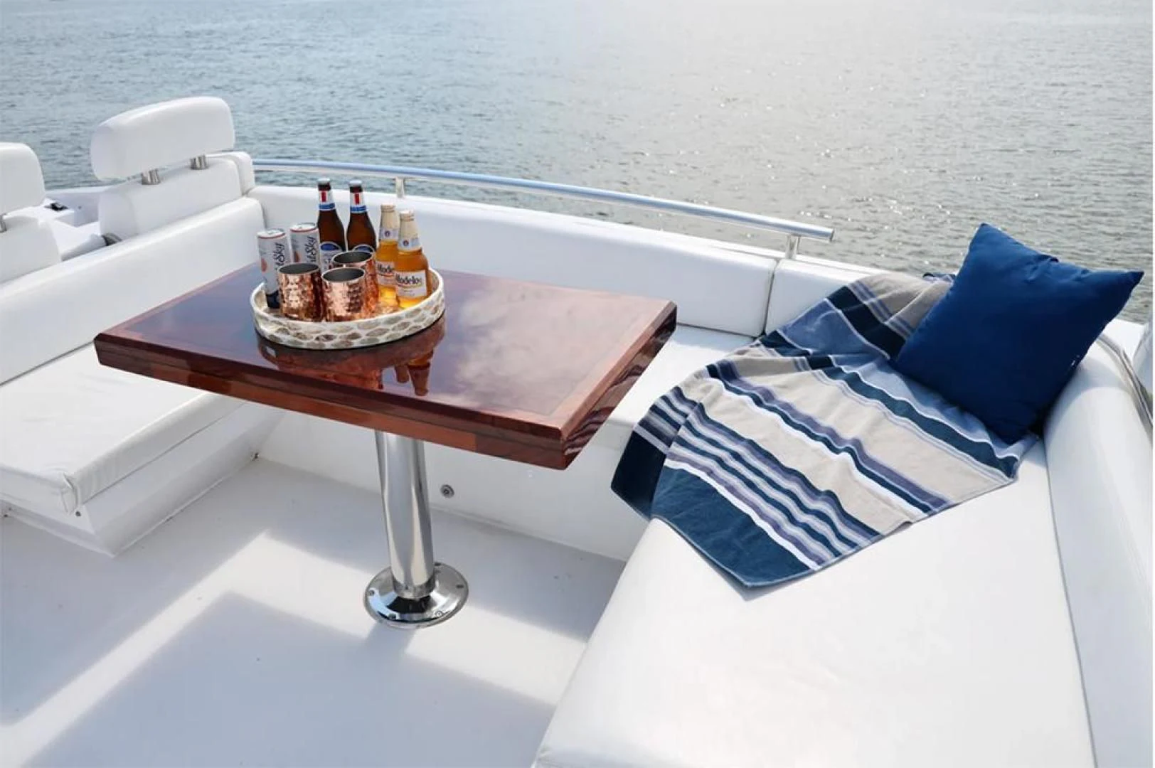 a table with a plate of food on it aboard LATITUDE Yacht for Sale
