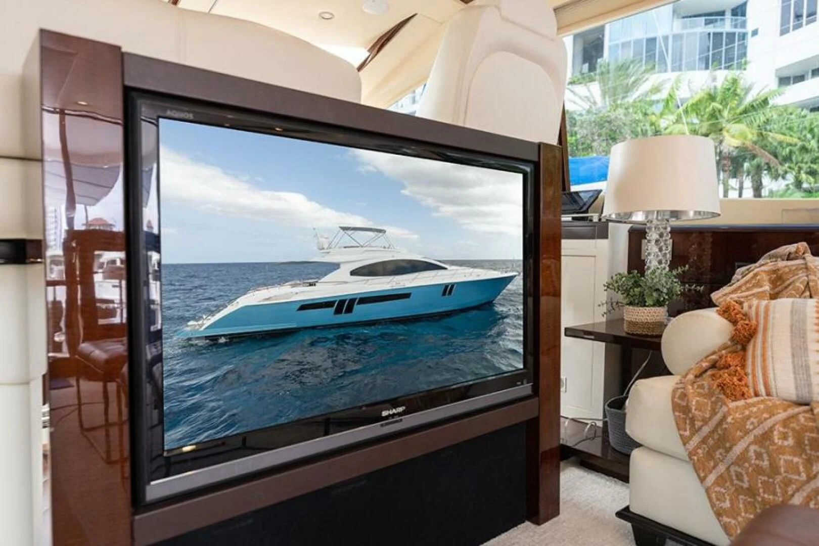 a large television screen aboard LATITUDE Yacht for Sale