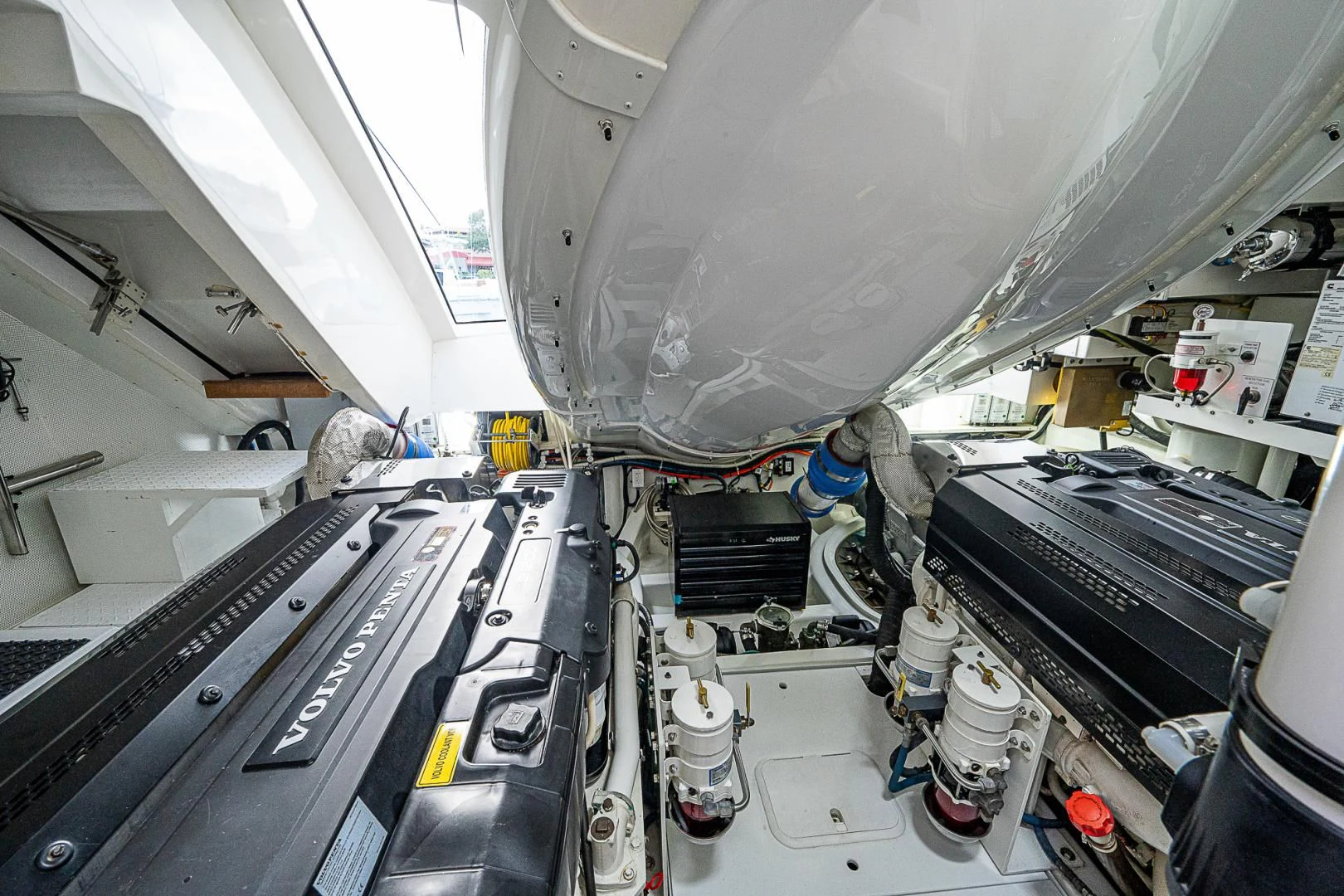 a large white machine with a large white ceiling aboard LATITUDE Yacht for Sale