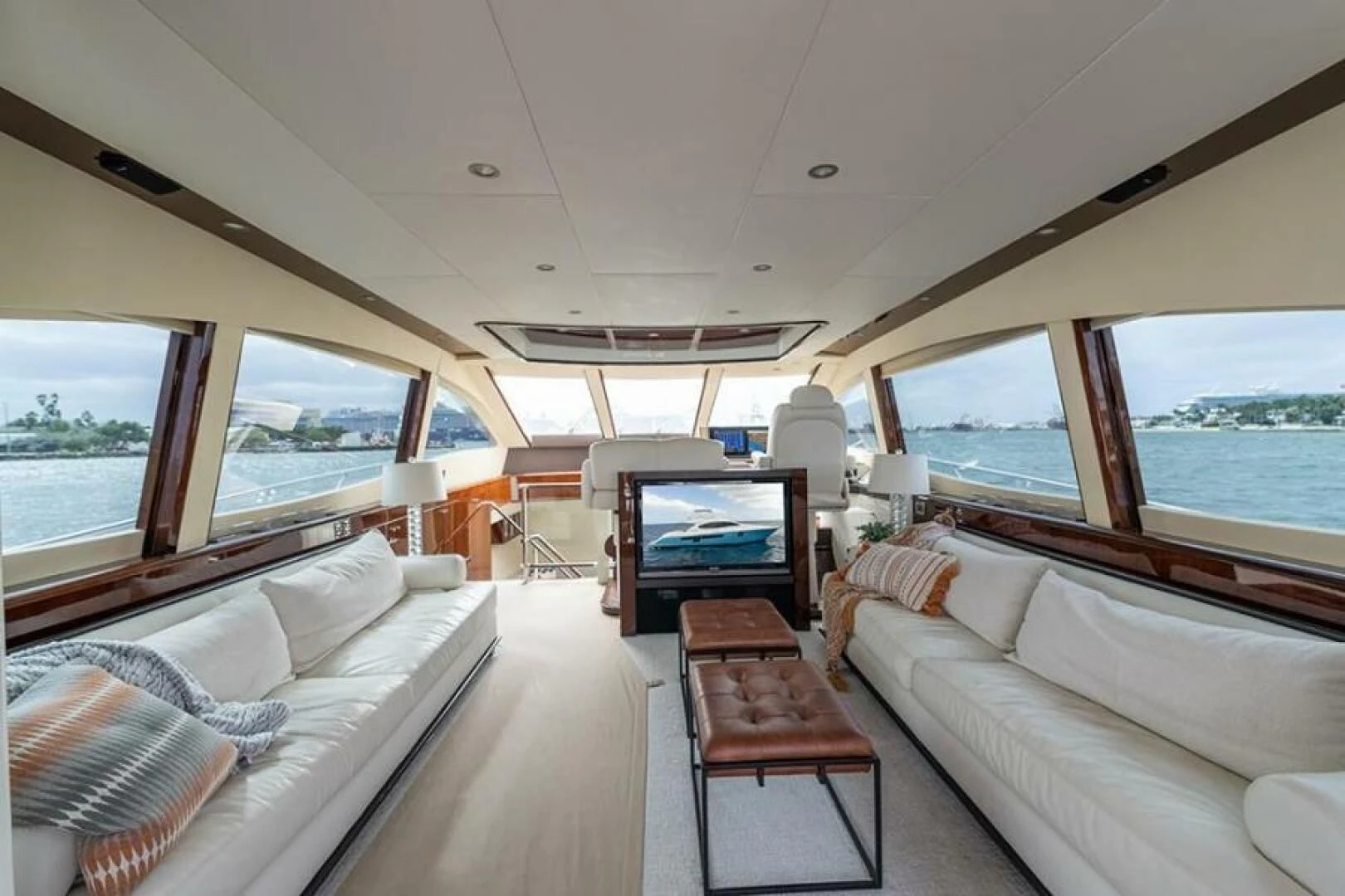 a living room with a large window aboard LATITUDE Yacht for Sale