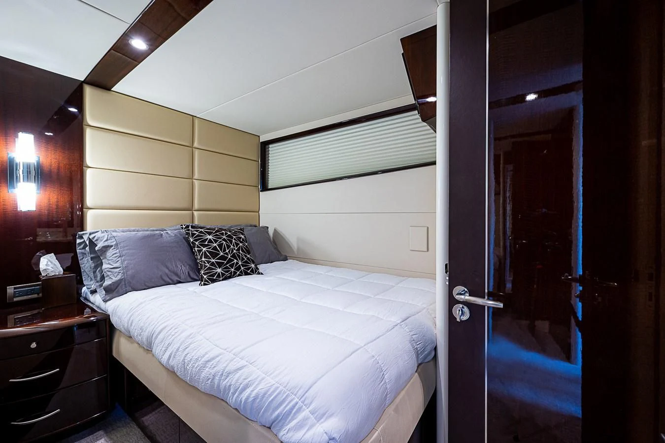 a bed in a room aboard LATITUDE Yacht for Sale