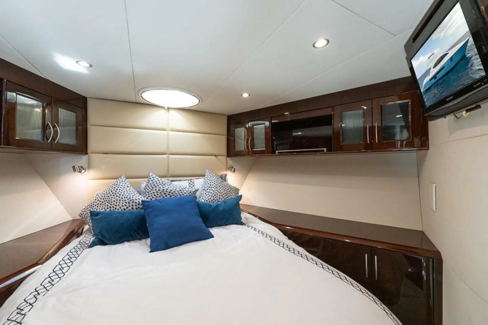 a large bedroom with a large bed aboard LATITUDE Yacht for Sale