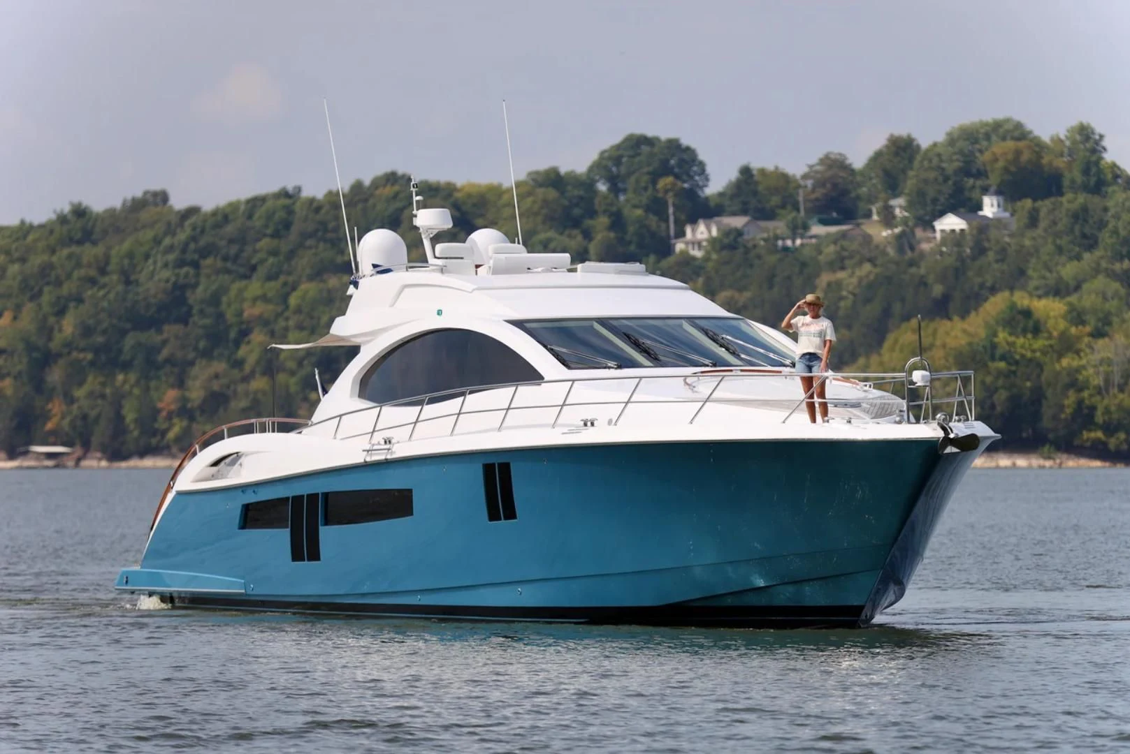 a person standing on a boat aboard LATITUDE Yacht for Sale