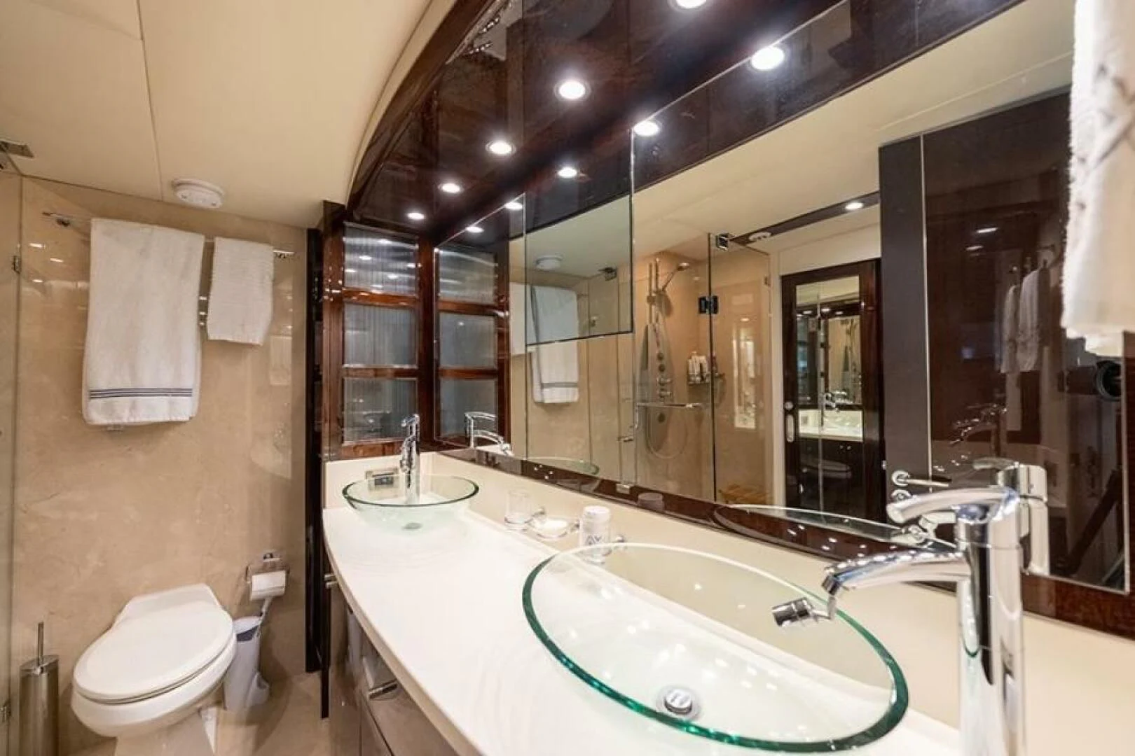 a bathroom with a large mirror aboard LATITUDE Yacht for Sale