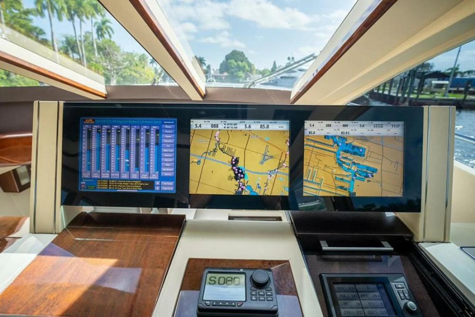 a computer with a screen and a game on the screen aboard LATITUDE Yacht for Sale