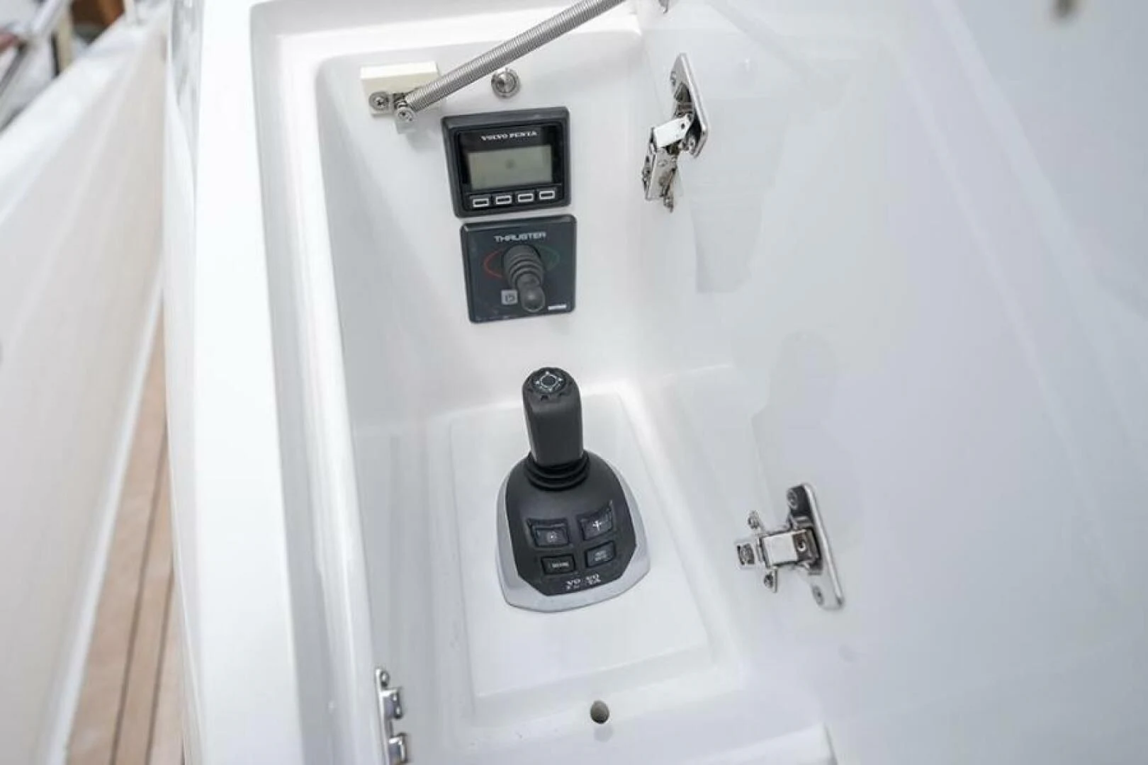 a white machine with a black dial aboard LATITUDE Yacht for Sale