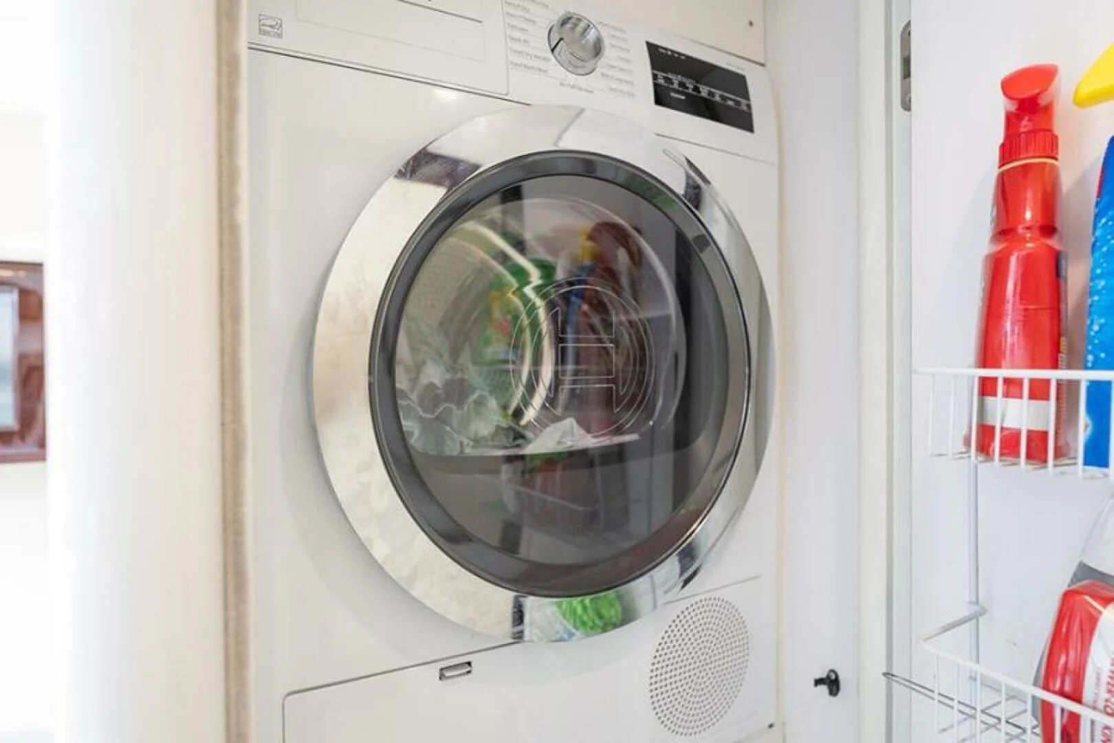 a white washing machine aboard LATITUDE Yacht for Sale