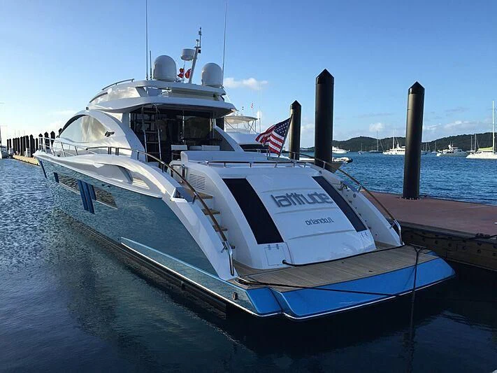 a boat docked at a pier aboard LATITUDE Yacht for Sale