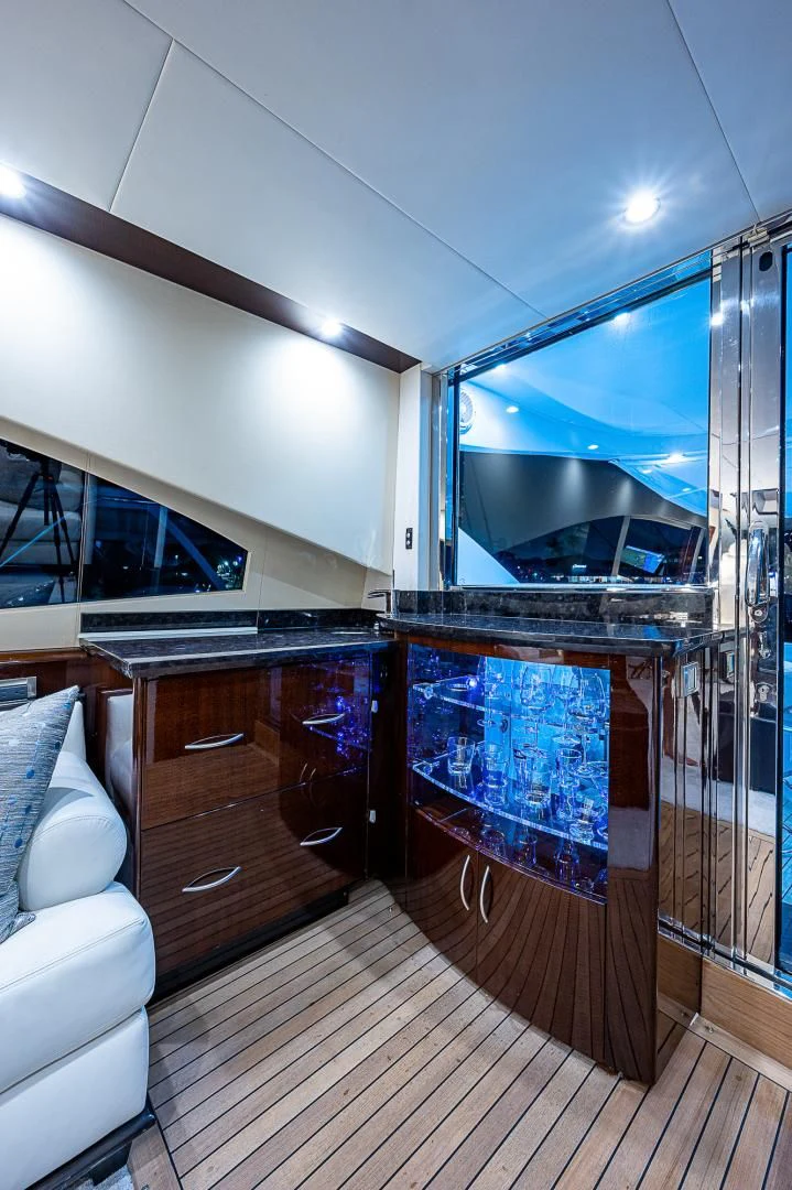 a kitchen with a glass wall aboard LATITUDE Yacht for Sale
