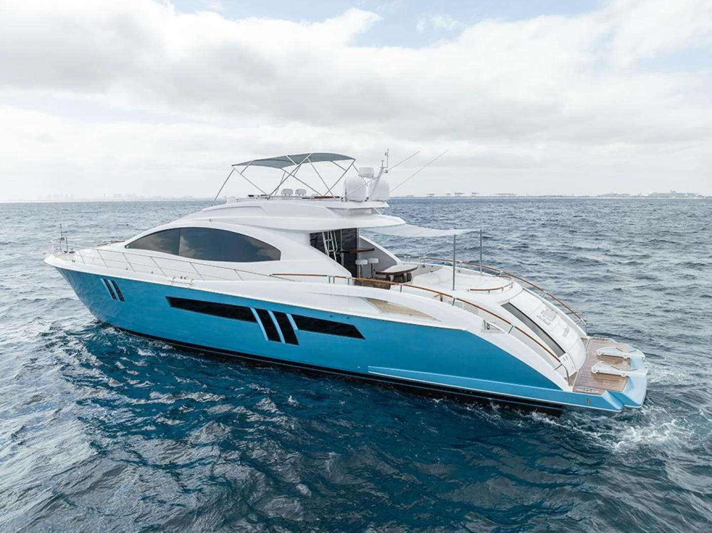 a white boat in the water aboard LATITUDE Yacht for Sale