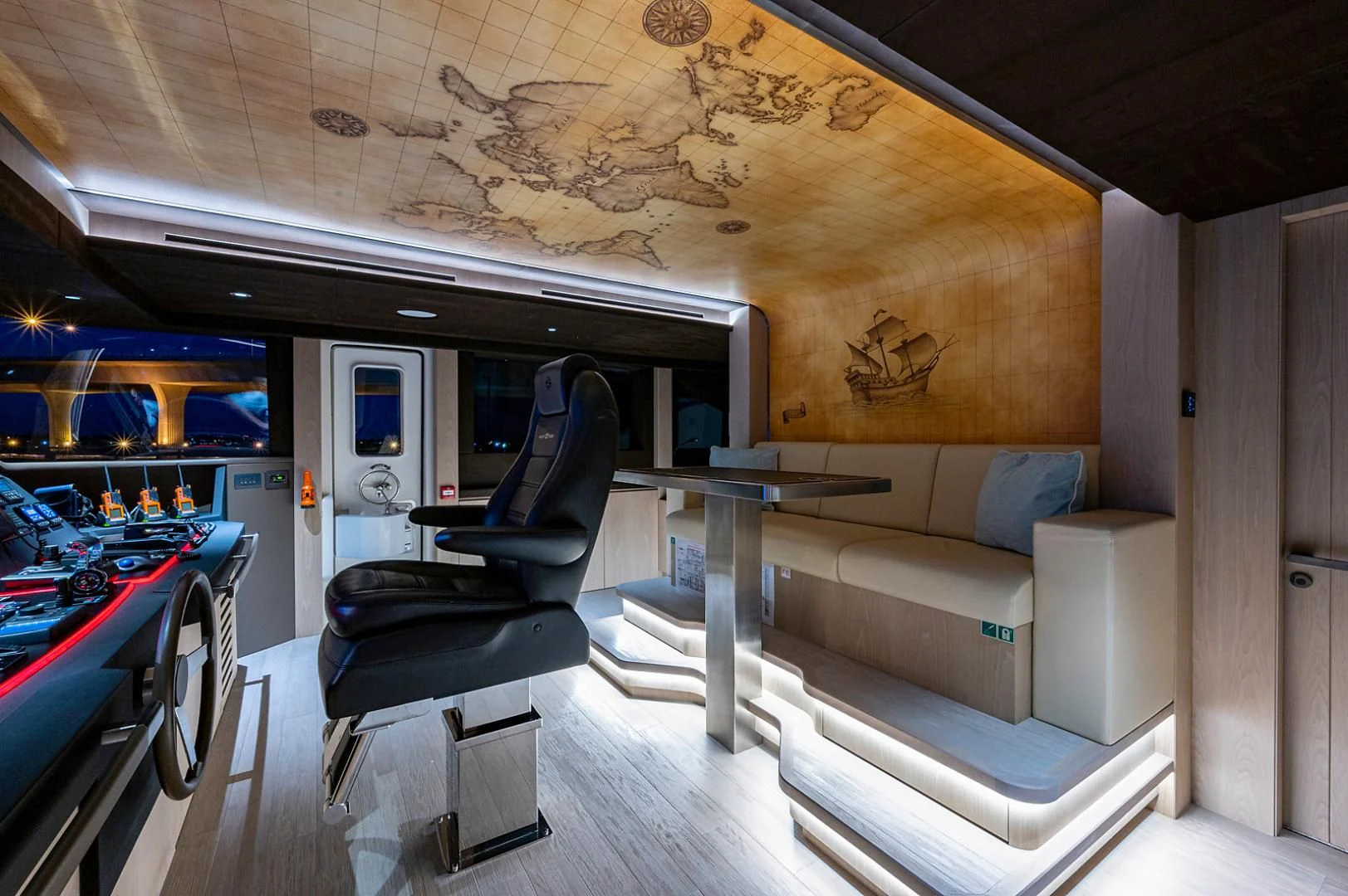 a room with a couch and a table aboard LIRA Yacht for Sale