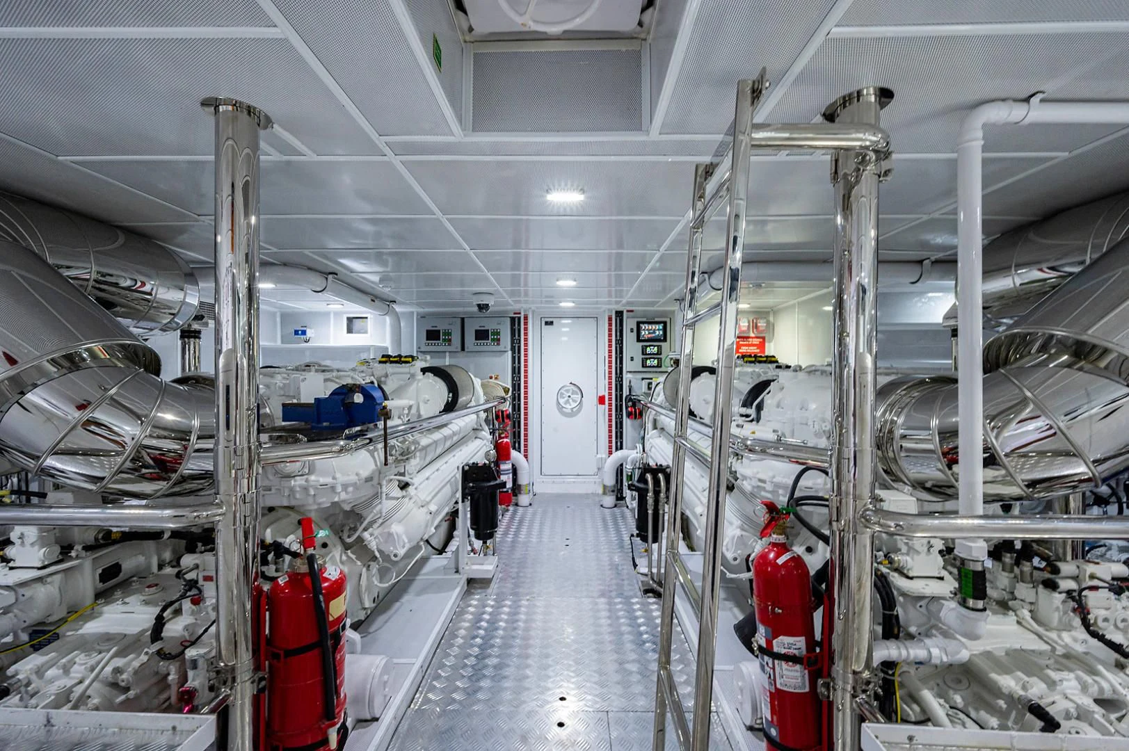a large factory with many pipes aboard LIRA Yacht for Sale