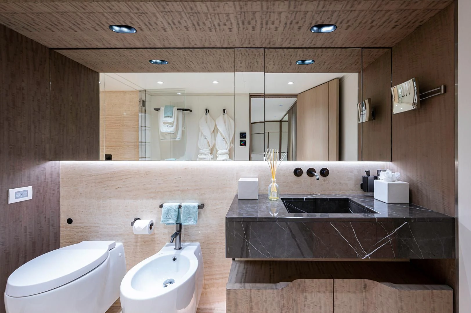 a bathroom with a sink and a toilet aboard LIRA Yacht for Sale