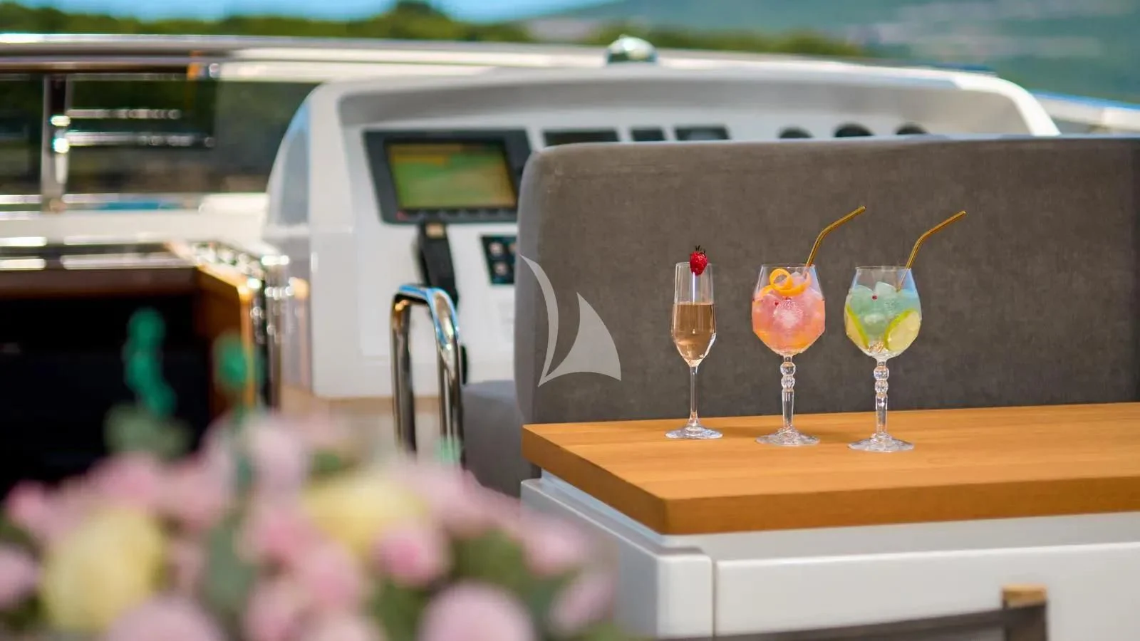 a group of glasses with drinks in them aboard PERTULA Yacht for Sale