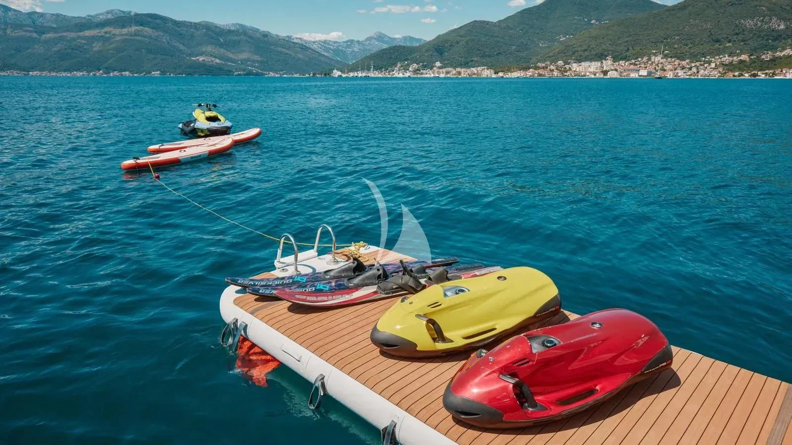 a group of boats on a body of water aboard PERTULA Yacht for Sale