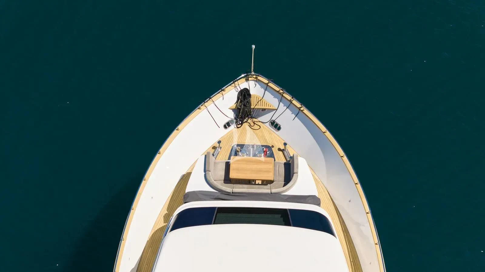 a yellow and white boat aboard PERTULA Yacht for Sale