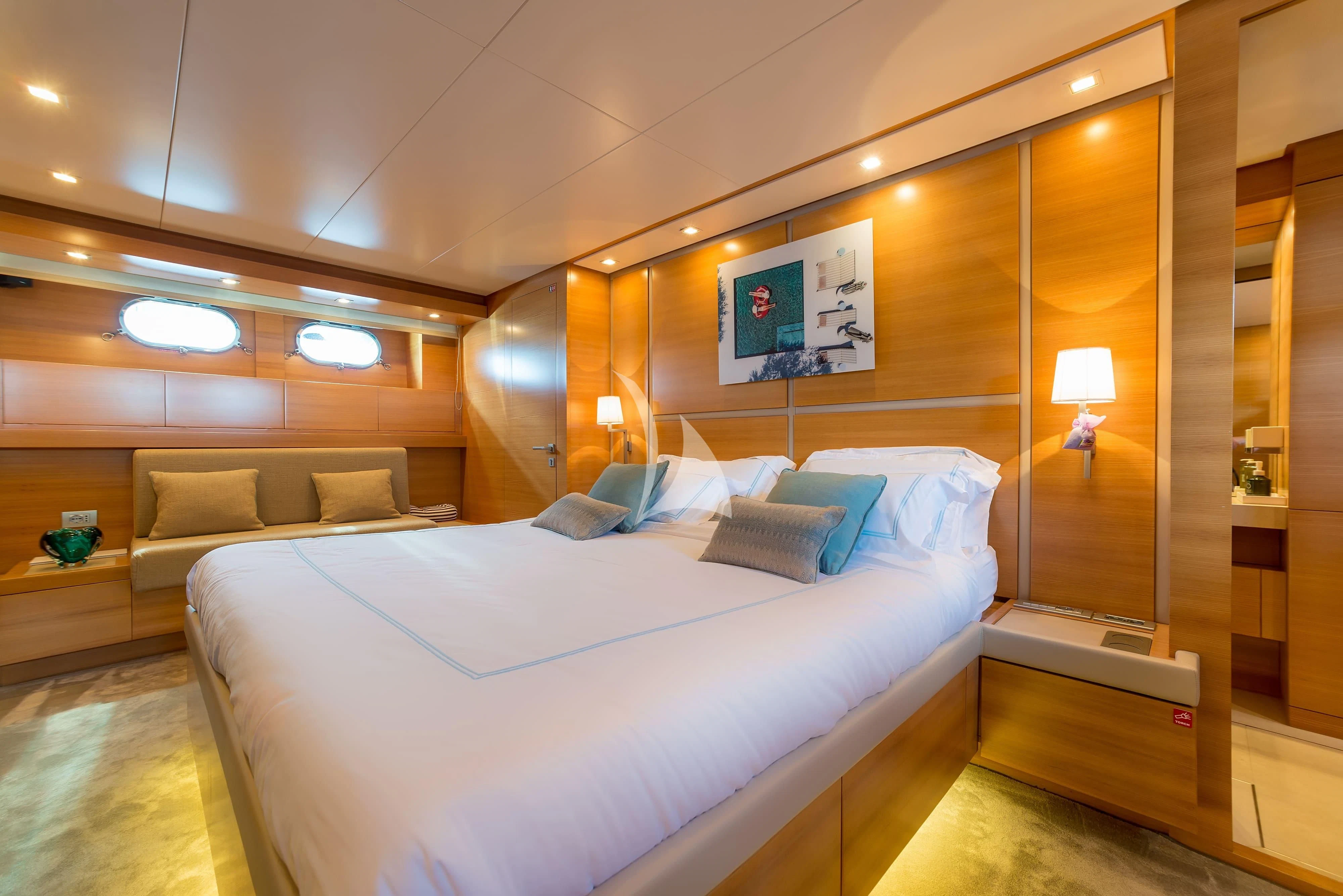 a bed in a room aboard PERTULA Yacht for Sale