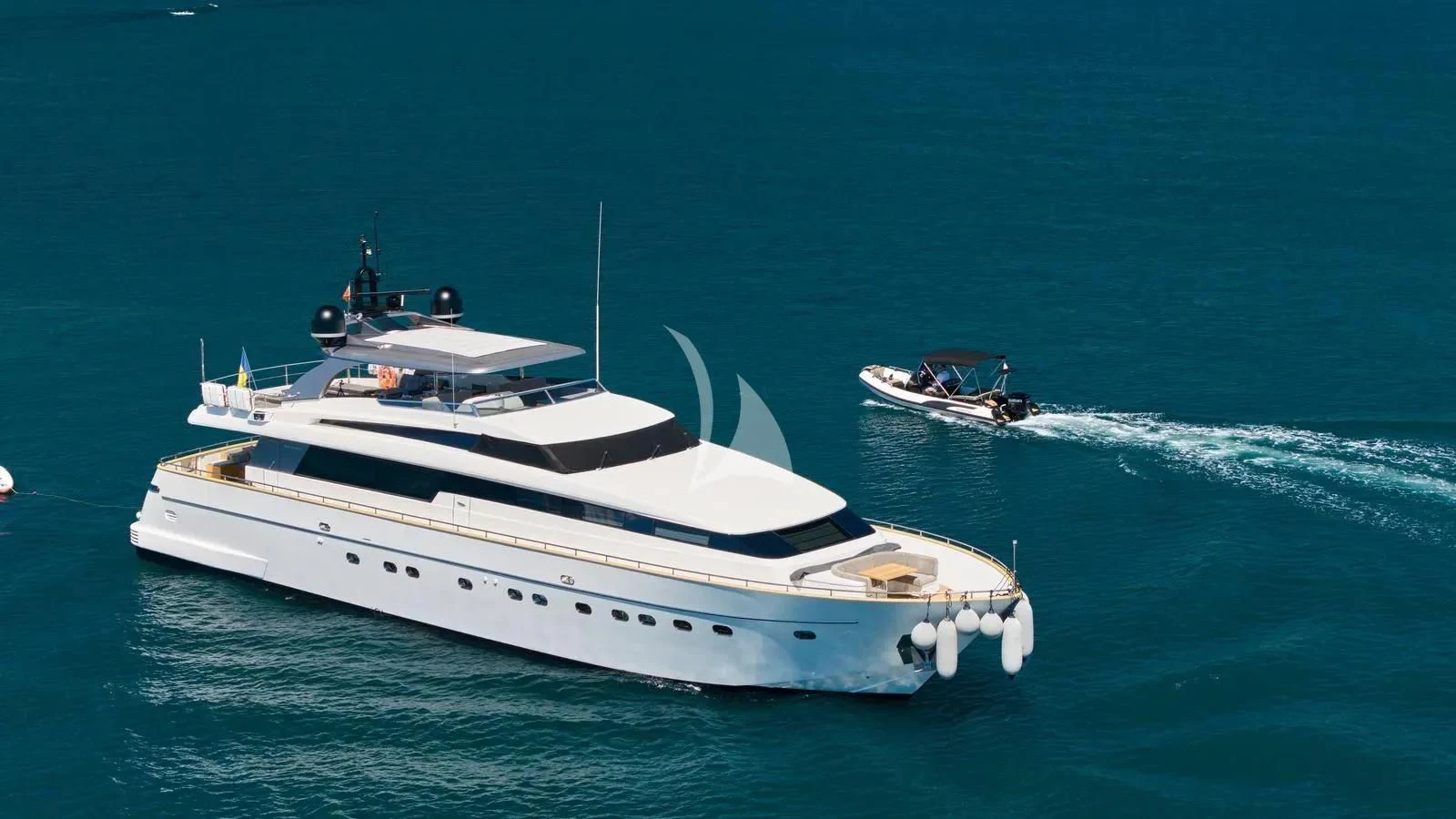 a boat with a boat in the water aboard PERTULA Yacht for Sale