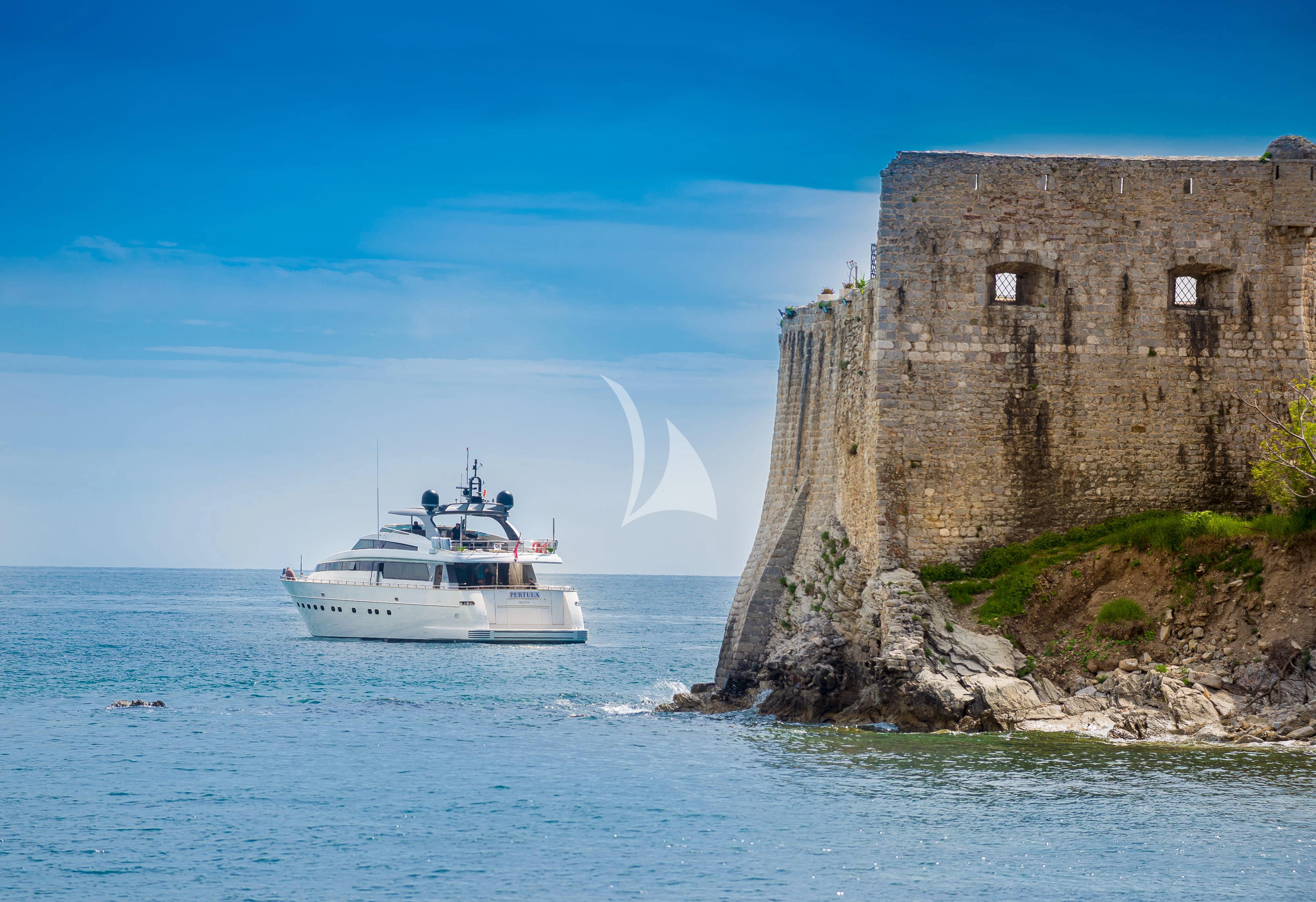 a boat sailing on the water aboard PERTULA Yacht for Sale