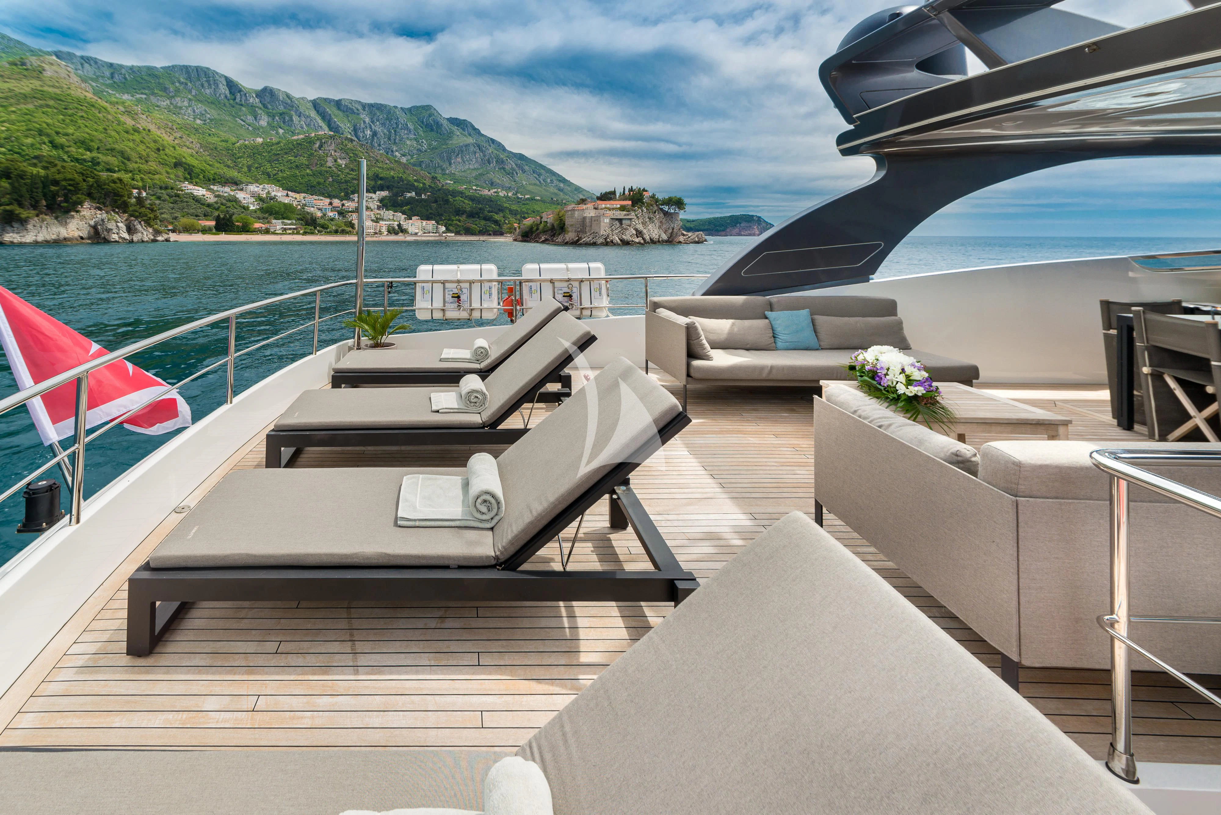 a boat on a deck aboard PERTULA Yacht for Sale