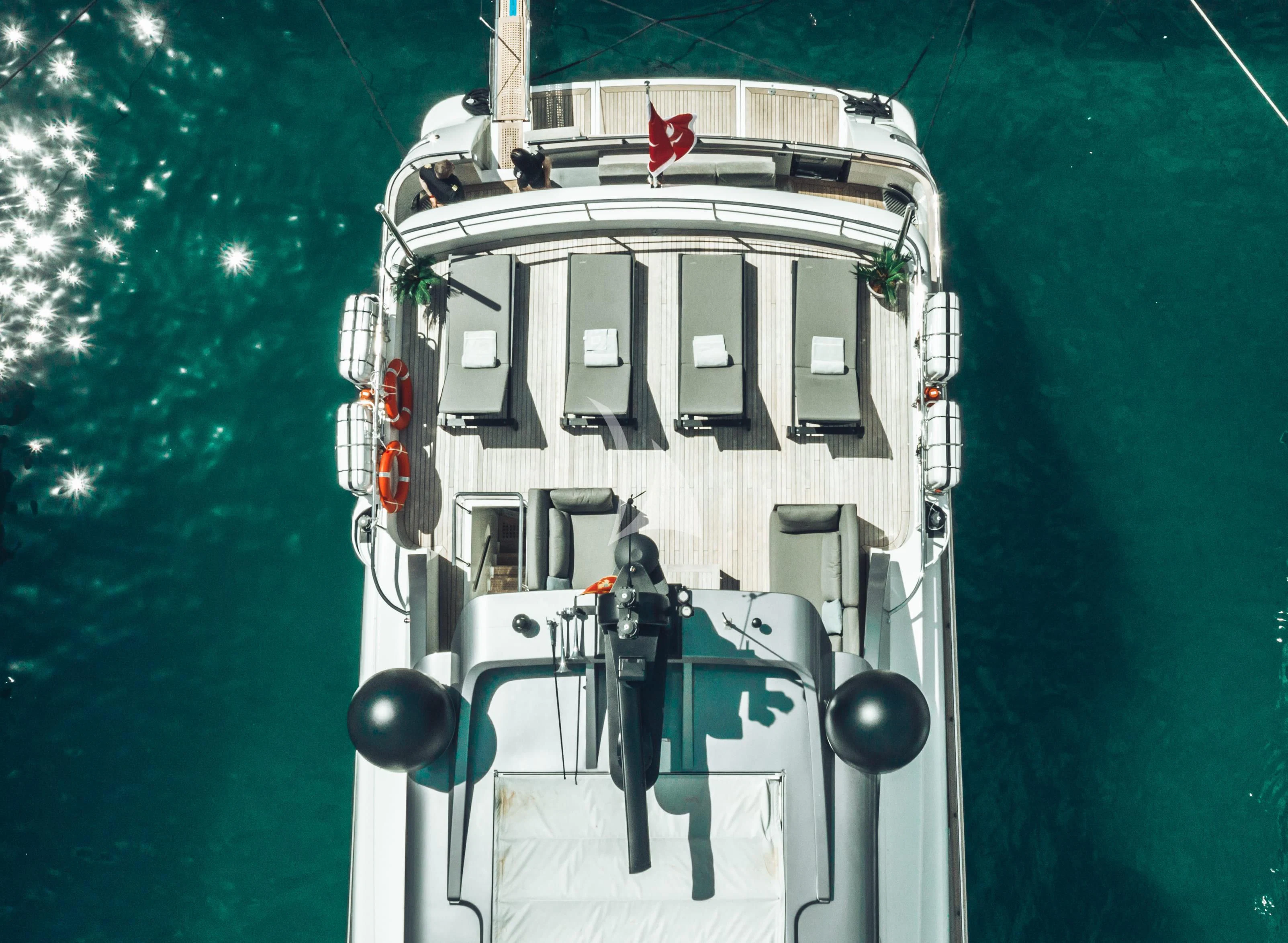 a person standing on a platform aboard PERTULA Yacht for Sale