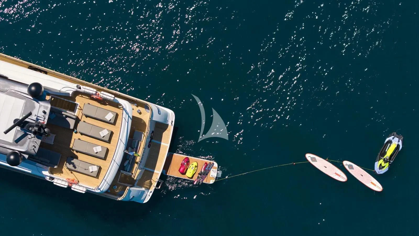a person on a boat in the water aboard PERTULA Yacht for Sale