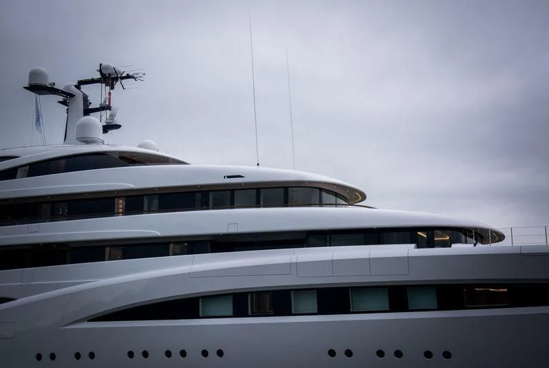 a white yacht with a helicopter on top aboard SOPHIA Yacht for Sale