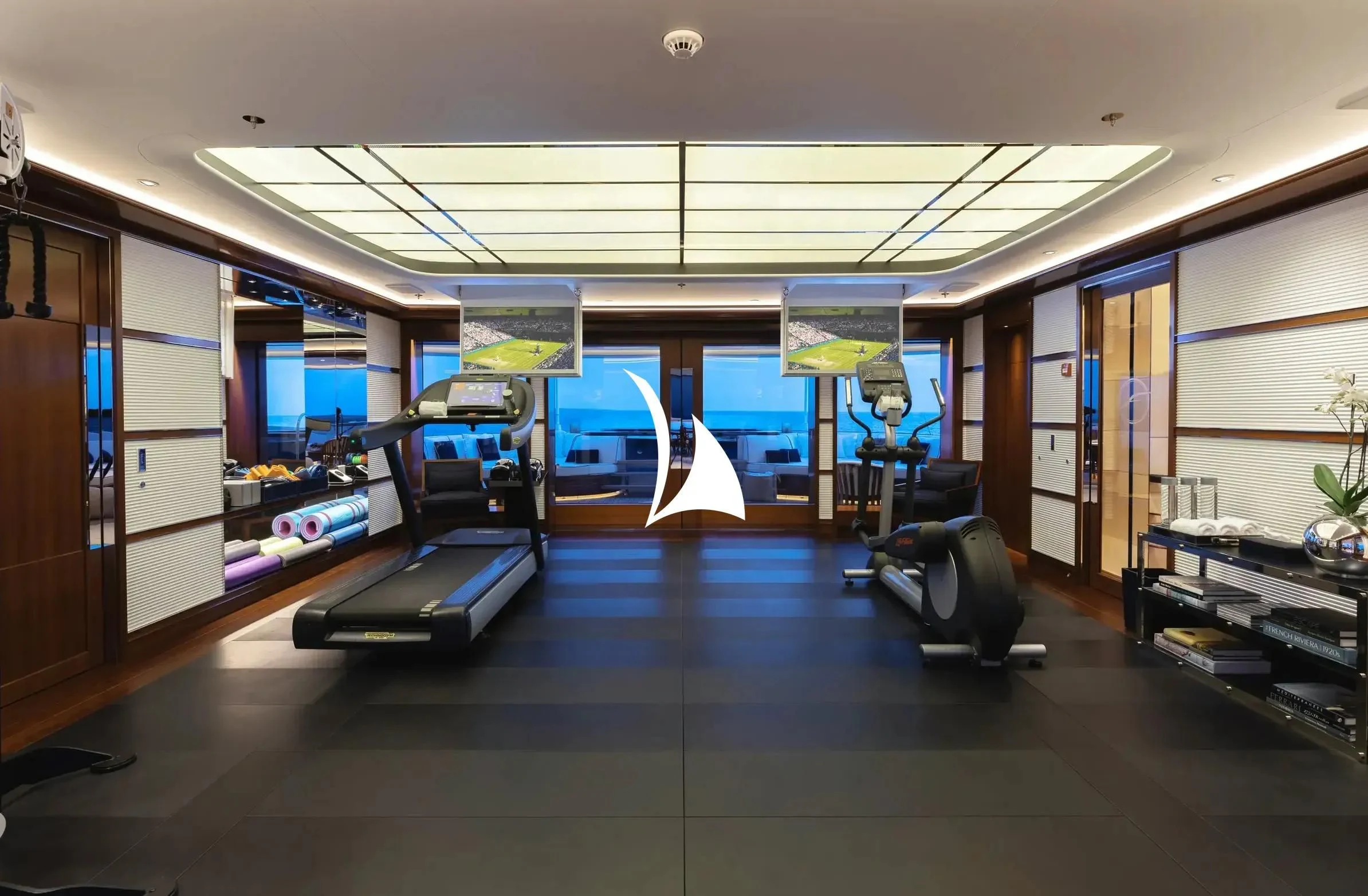 a room with a large blue screen aboard SOPHIA Yacht for Sale