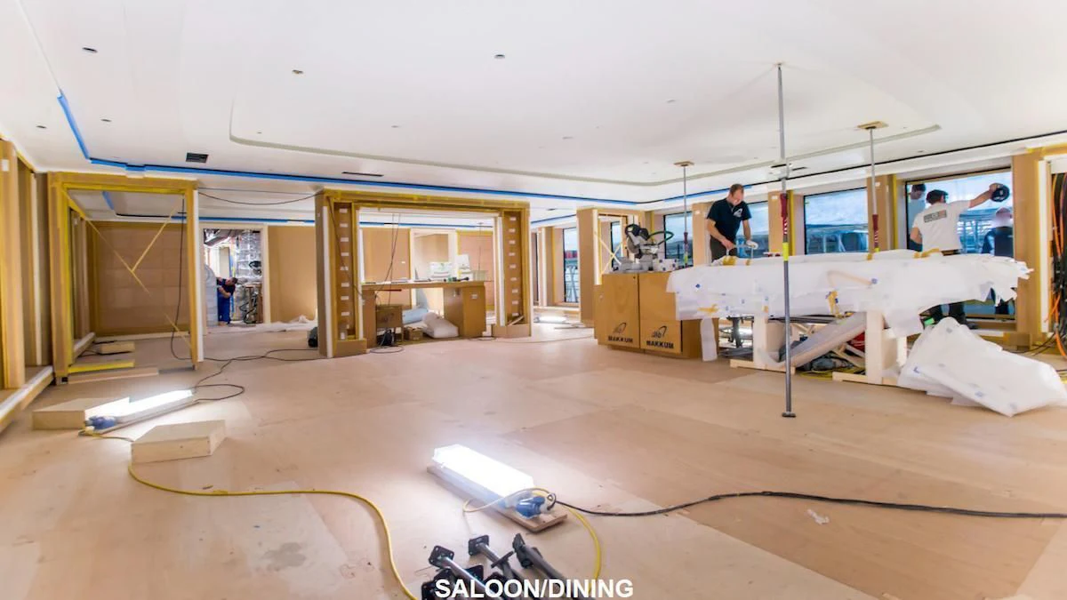 a person working on a project aboard SOPHIA Yacht for Sale