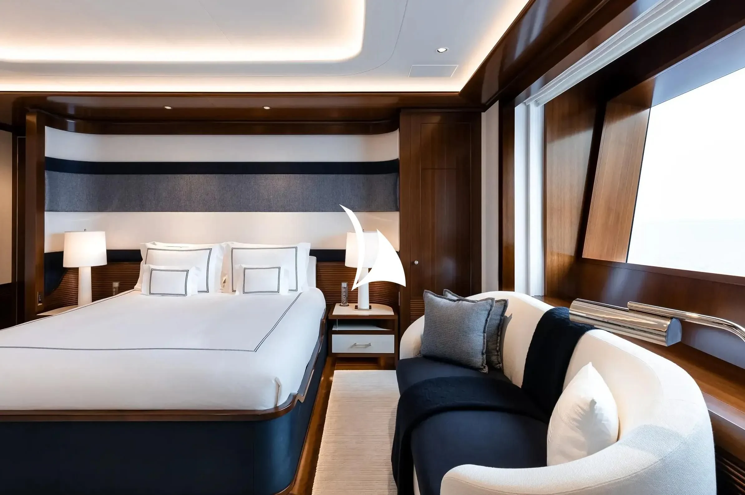 a room with a bed and a couch aboard SOPHIA Yacht for Sale