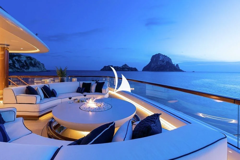a large patio with a table and chairs on it aboard SOPHIA Yacht for Sale