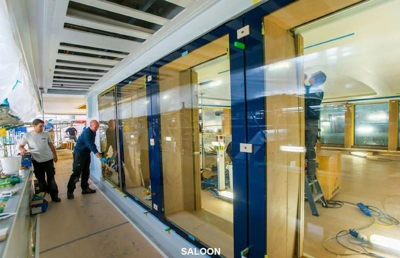 a few men working in a factory aboard SOPHIA Yacht for Sale