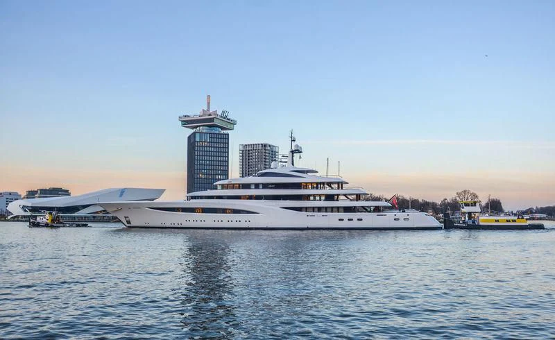 a large white ship in the water aboard SOPHIA Yacht for Sale