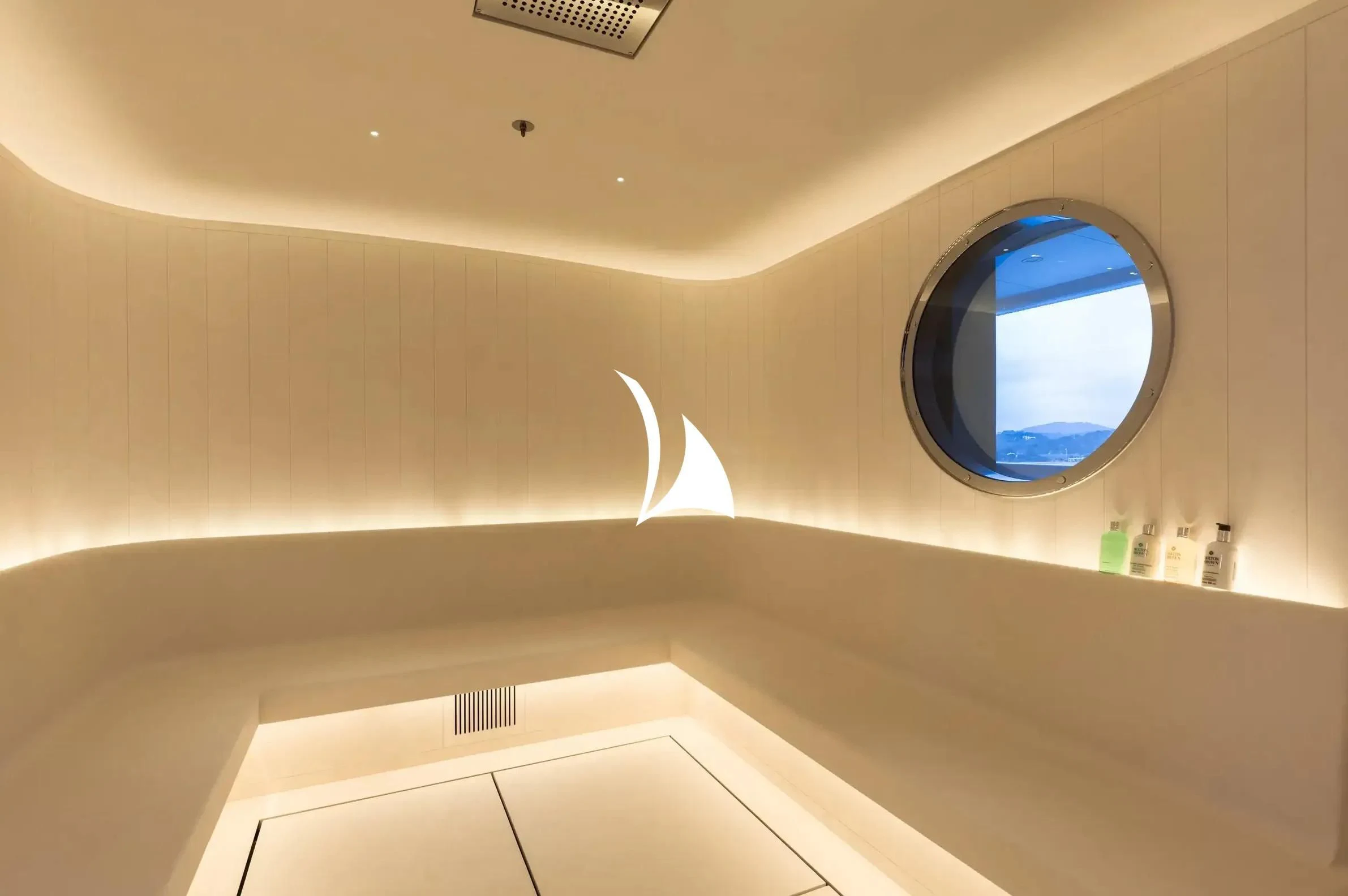 a bathroom with a large mirror aboard SOPHIA Yacht for Sale