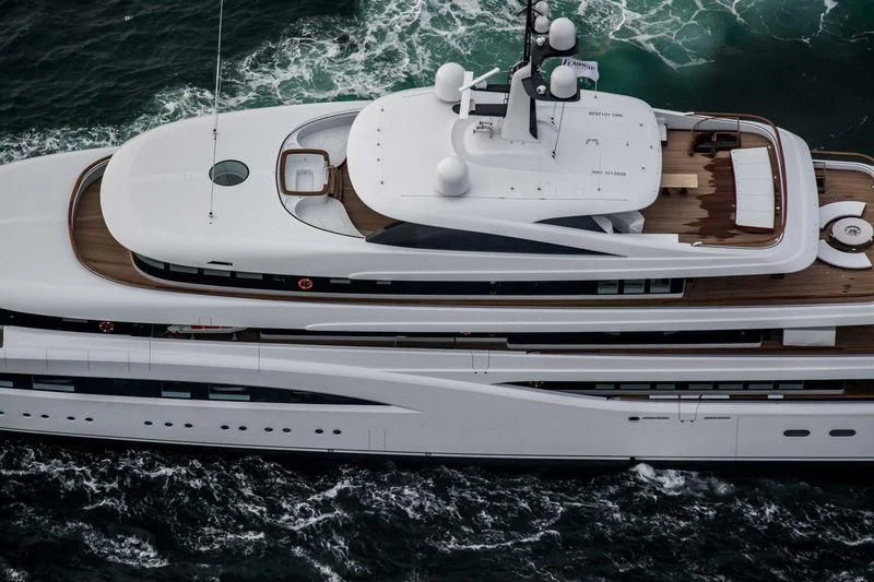 a white boat with a white boat on the water aboard SOPHIA Yacht for Sale
