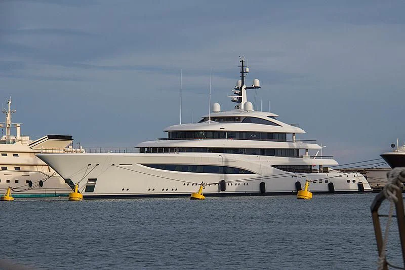 a large white ship in the water aboard SOPHIA Yacht for Sale