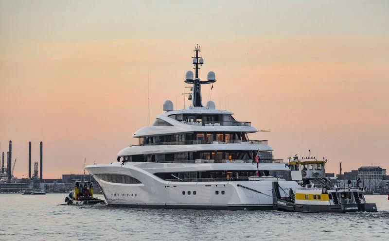 a large white ship in the water aboard SOPHIA Yacht for Sale