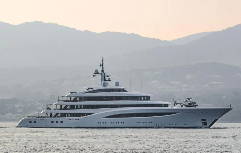 a large white ship in the water aboard SOPHIA Yacht for Sale