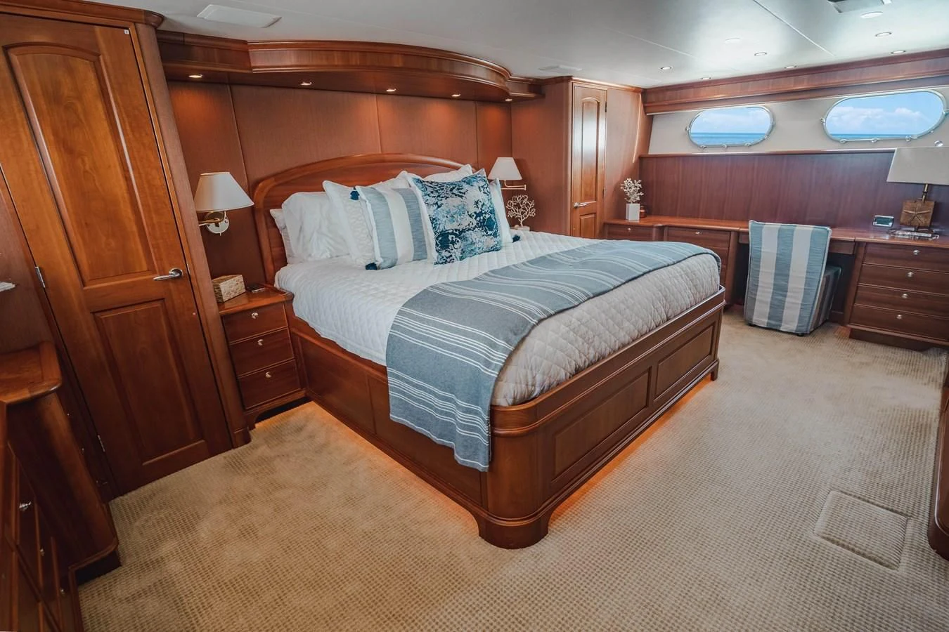 a bed in a room aboard L'DOR V'DOR Yacht for Sale