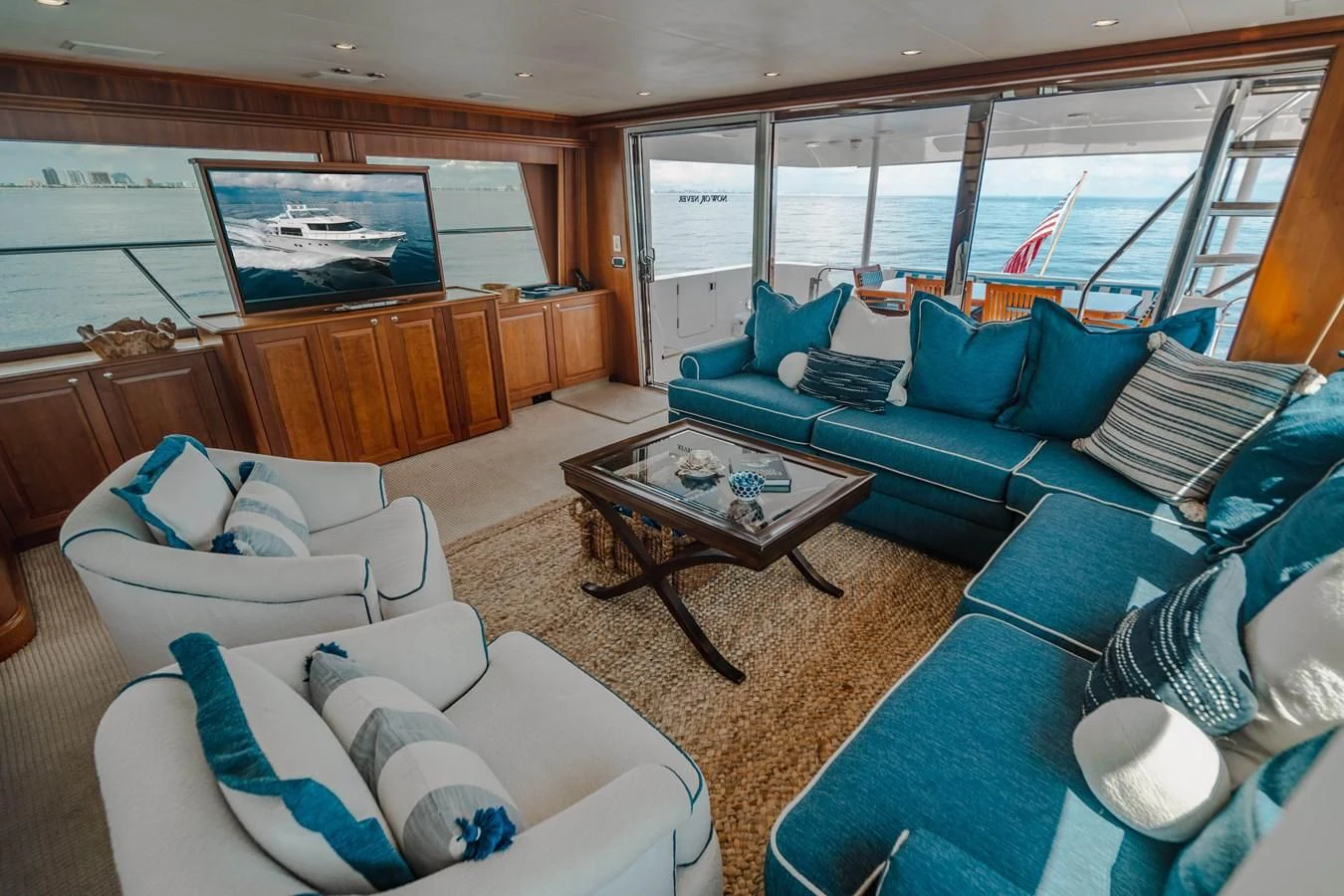 a living room with a boat aboard L'DOR V'DOR Yacht for Sale