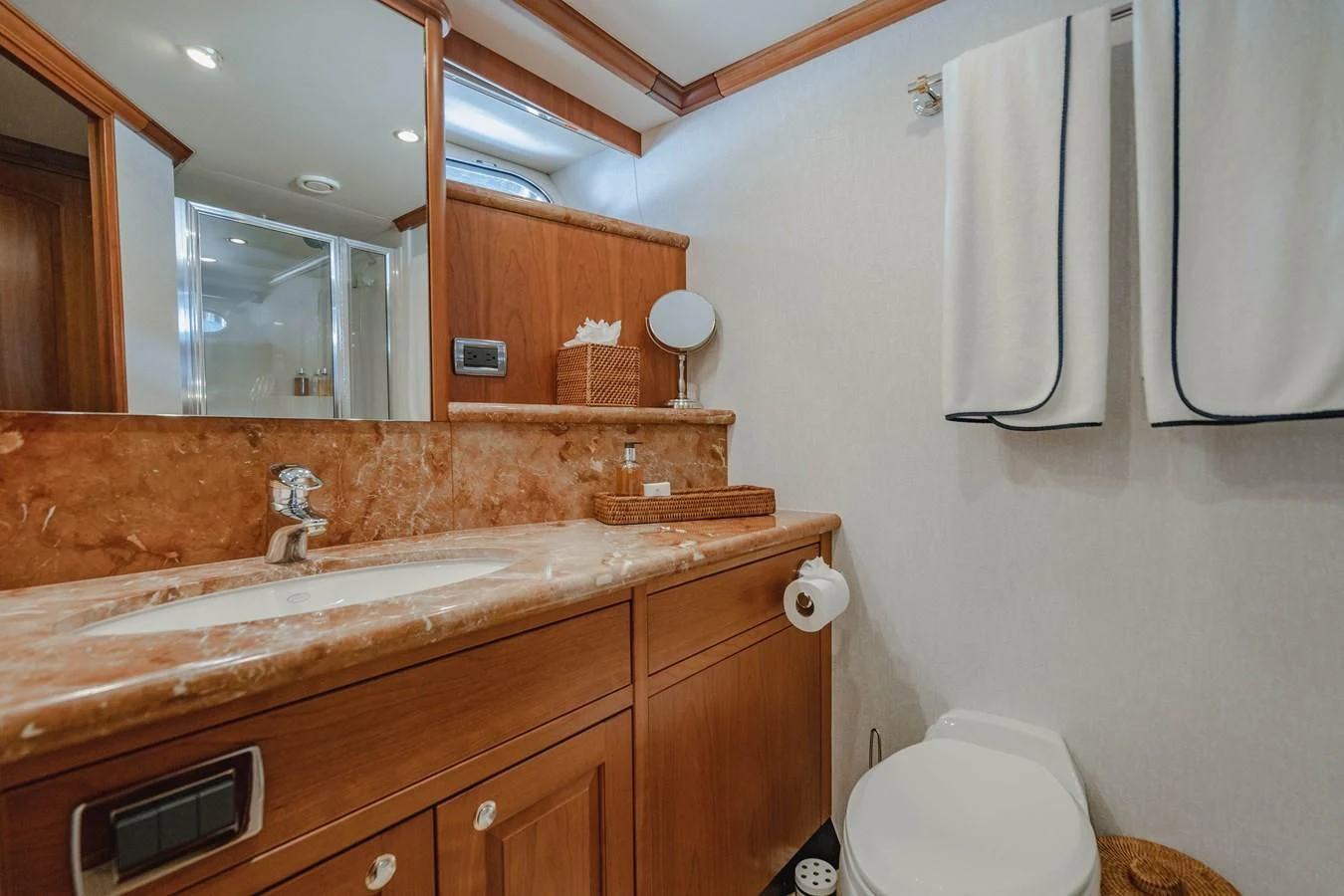 a bathroom with a sink and toilet aboard L'DOR V'DOR Yacht for Sale