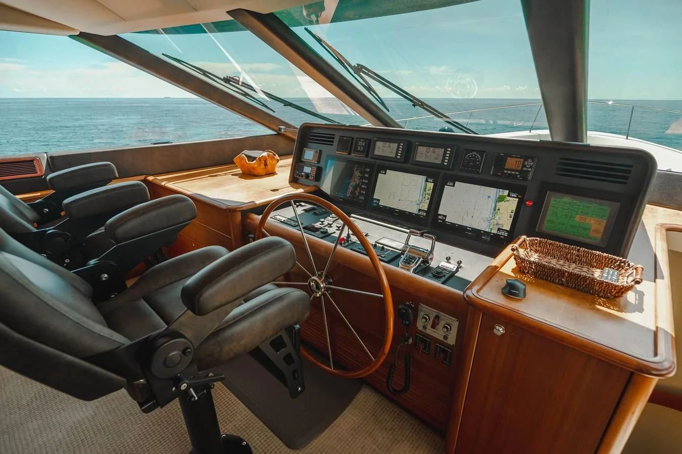 a boat with a desk and computer aboard L'DOR V'DOR Yacht for Sale