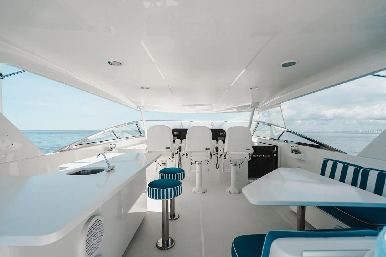 a boat with chairs on the deck aboard L'DOR V'DOR Yacht for Sale