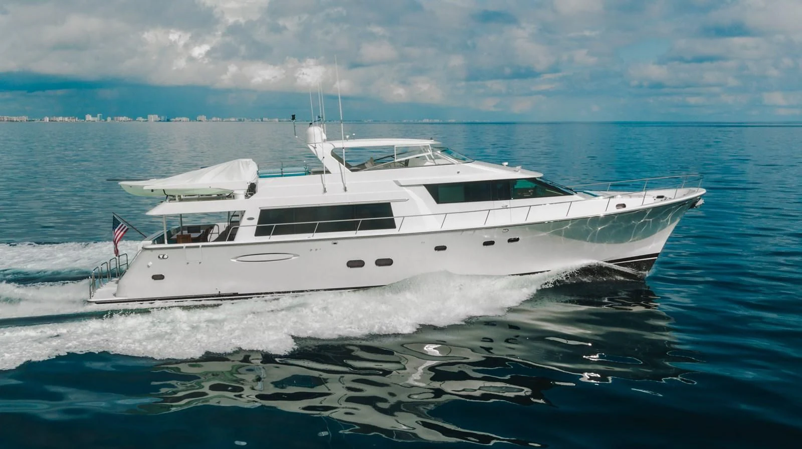 a white yacht in the water aboard L'DOR V'DOR Yacht for Sale