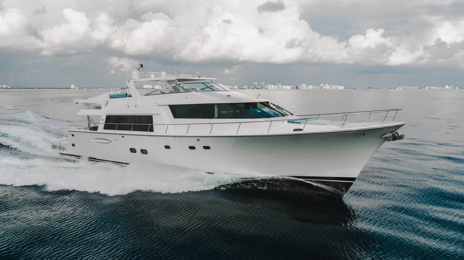 a white yacht in the water aboard L'DOR V'DOR Yacht for Sale