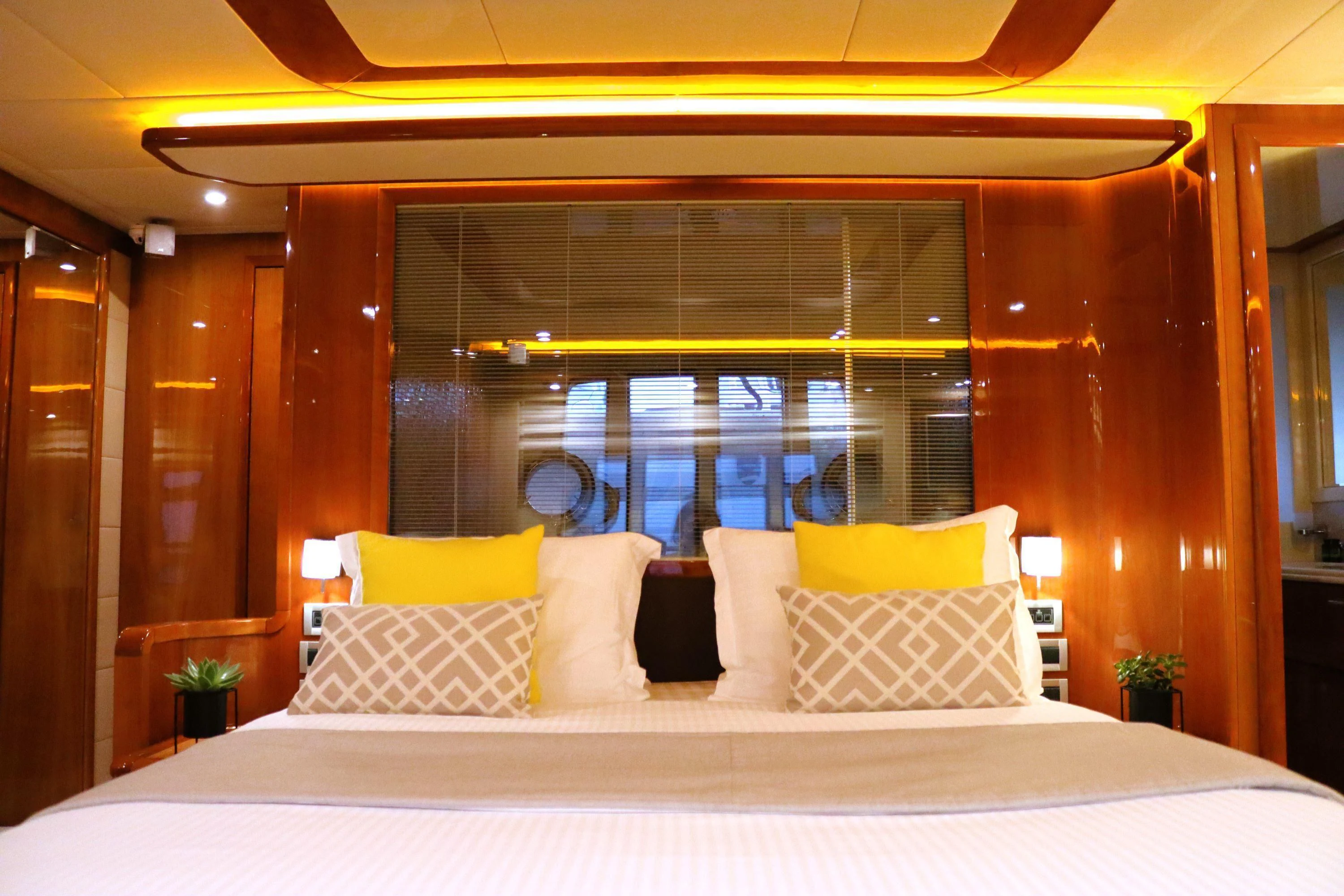 a bed with pillows and pillows aboard ASTARTE Yacht for Sale