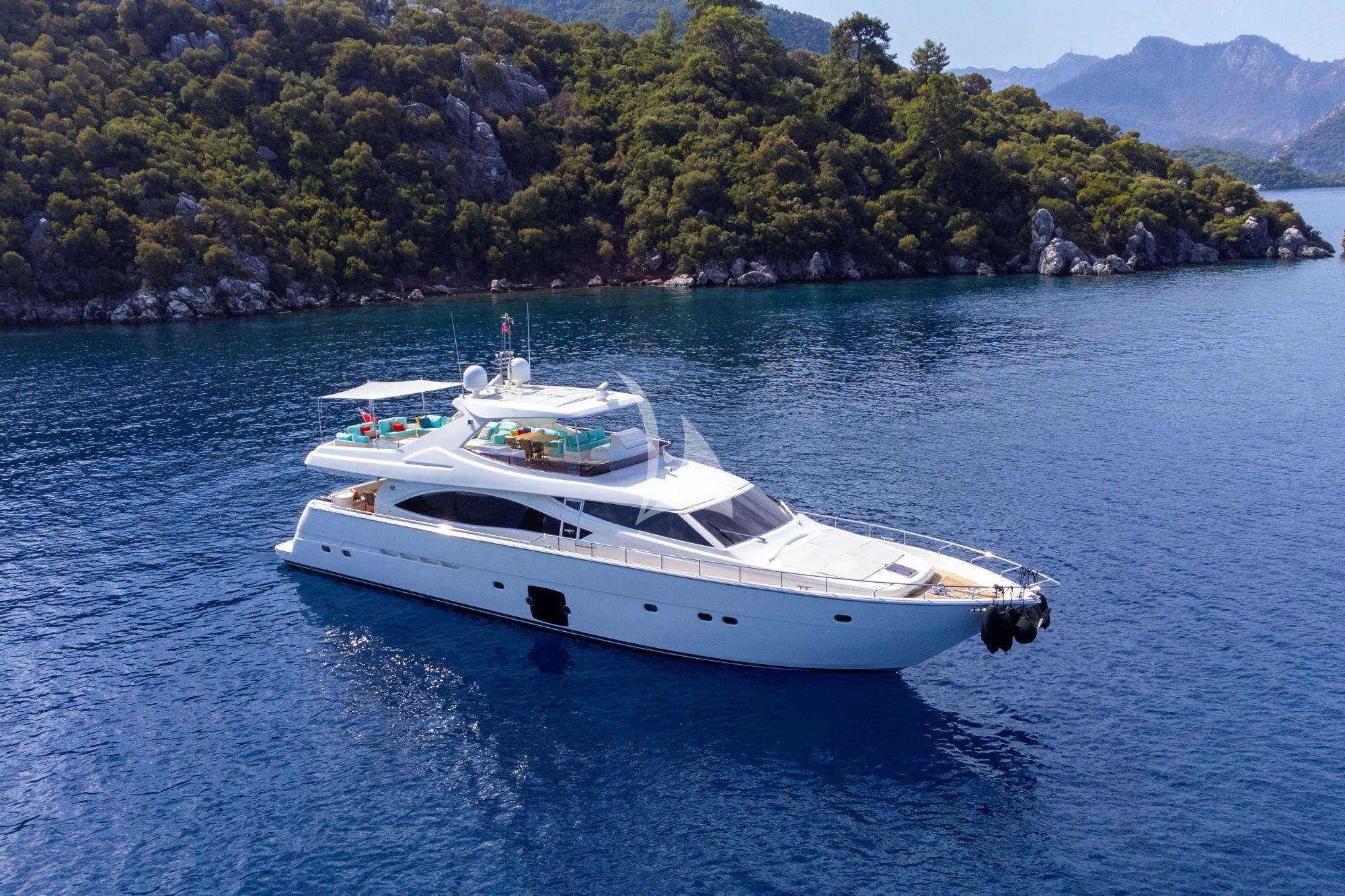 a white yacht on the water aboard ASTARTE Yacht for Sale
