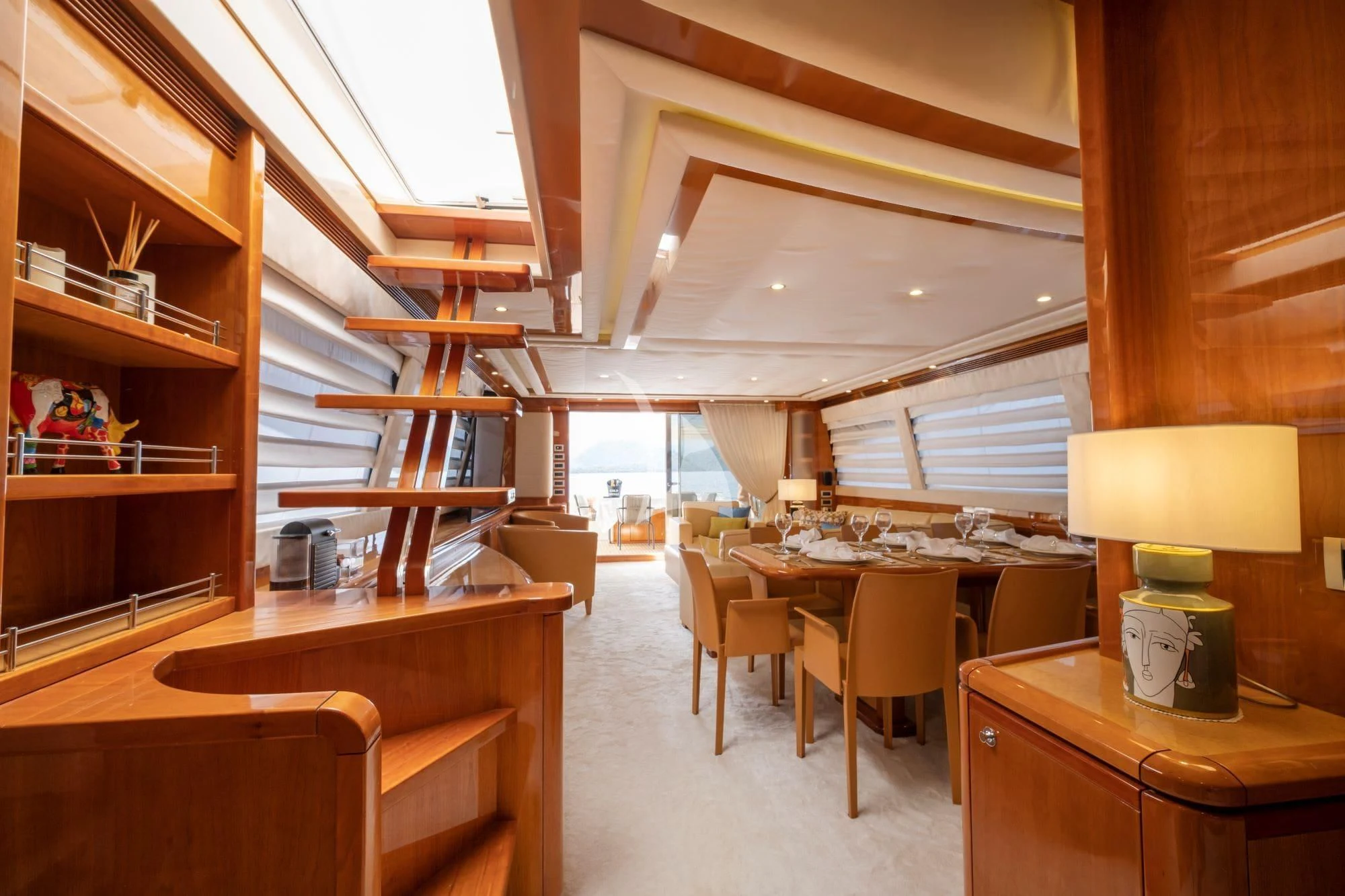 a room with wooden furniture aboard ASTARTE Yacht for Sale